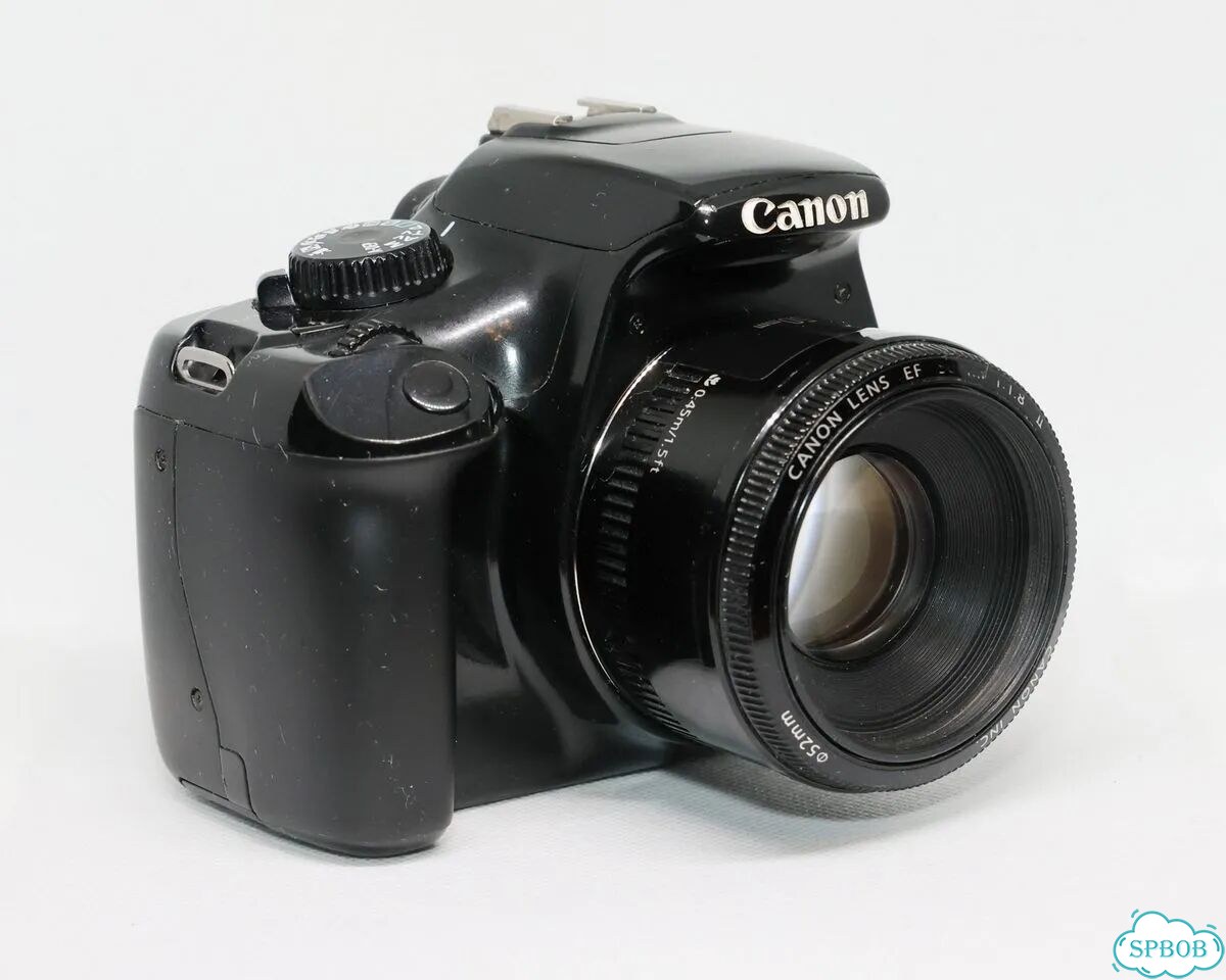Фотоаппарат Canon EOS 1100D с объективом фото 2