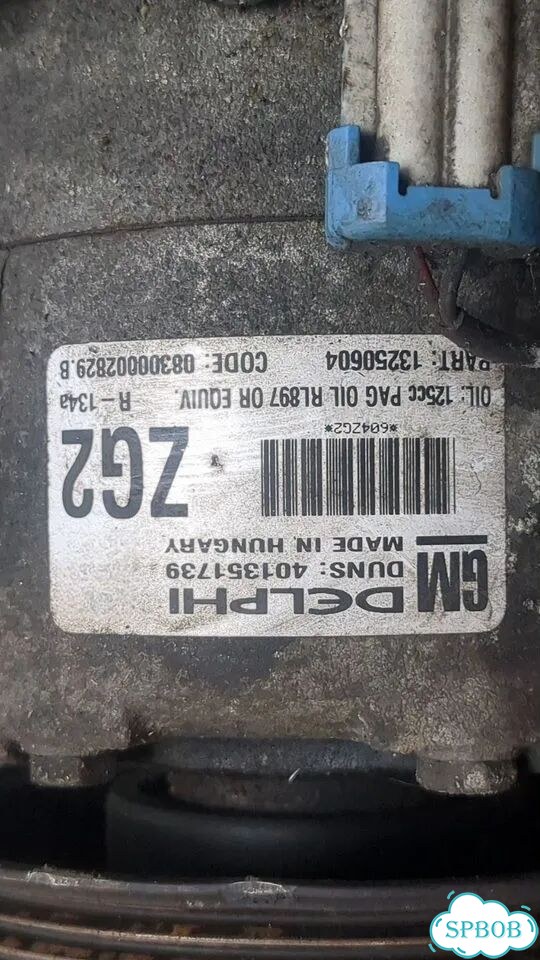 Компрессор кондиционера Opel Astra J фото 4