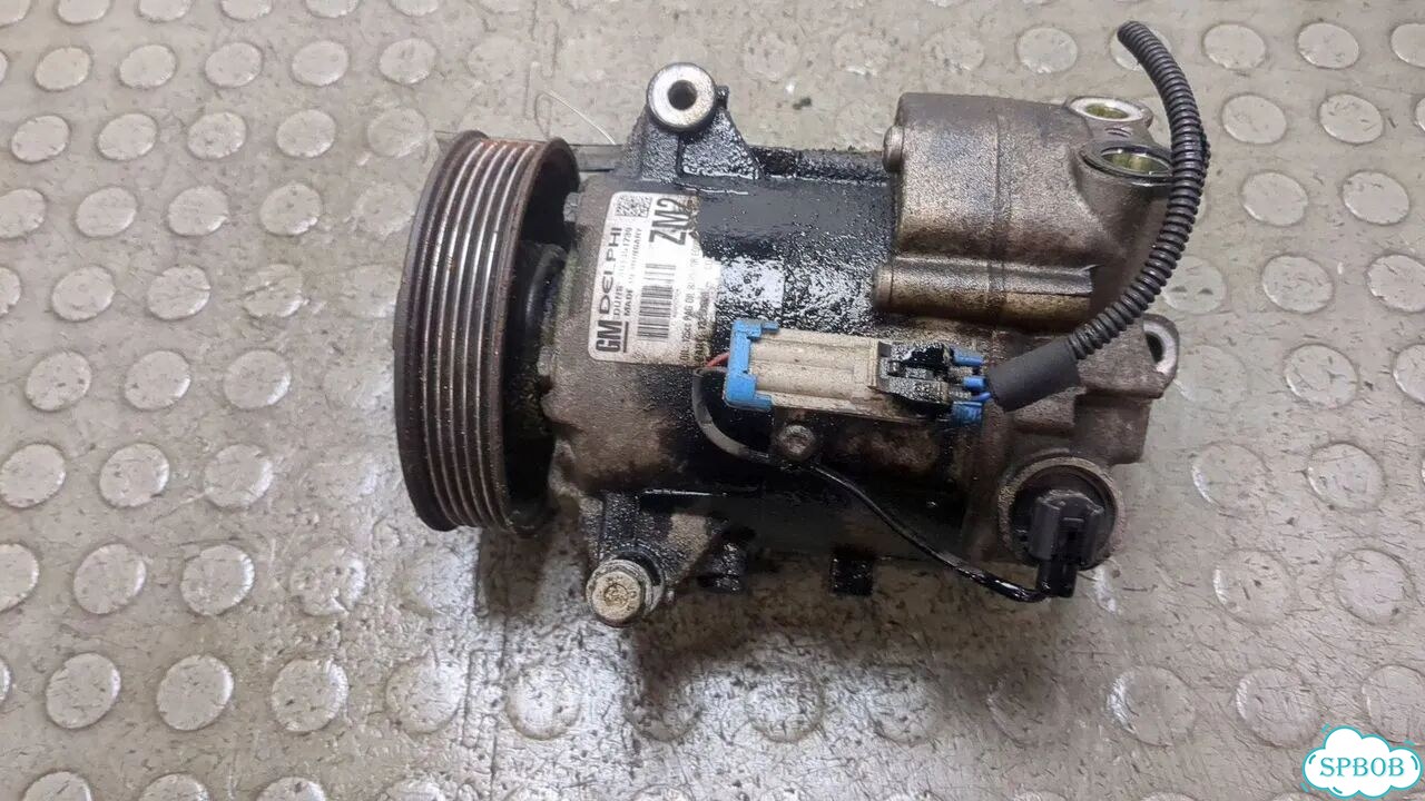 Компрессор кондиционера Opel Astra J фото 1
