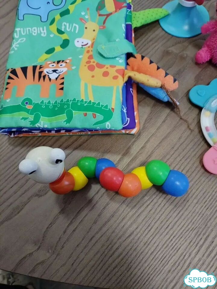 Игрушки пакетом до года фото 5