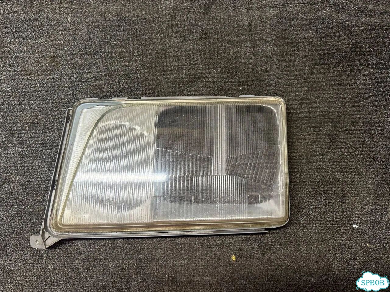 Стекло фары Hella Mercedes-Benz E W124 фото 1