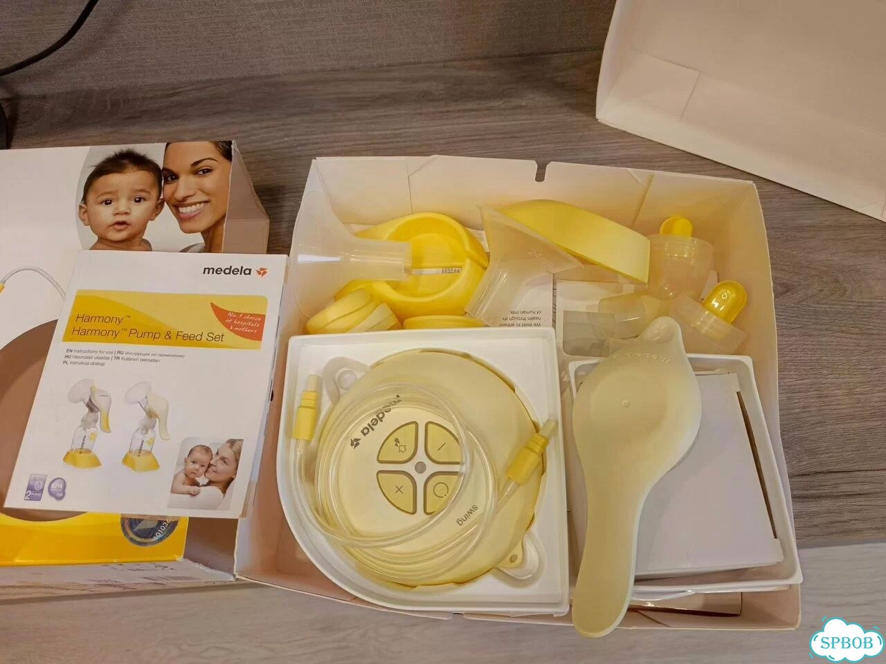 Молокоотсос medela электрический+ ручной фото 1