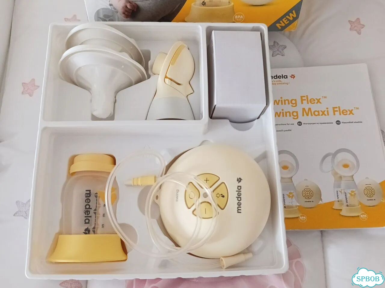 Молокоотсос medela swing flex электрический фото 2