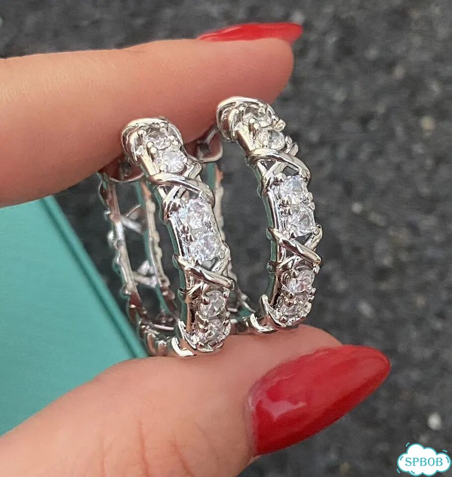 Шикарные серьги Tiffany серебристые средние фото 3