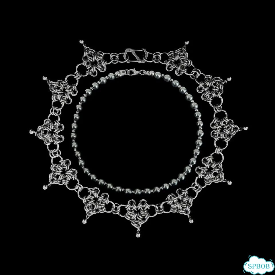 Украшение из соединительных колец C.C фото 3