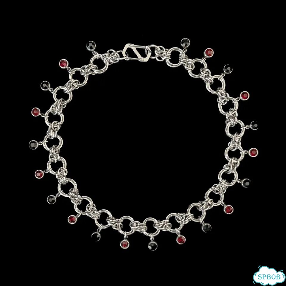 Украшение из соединительных колец C.C фото 6
