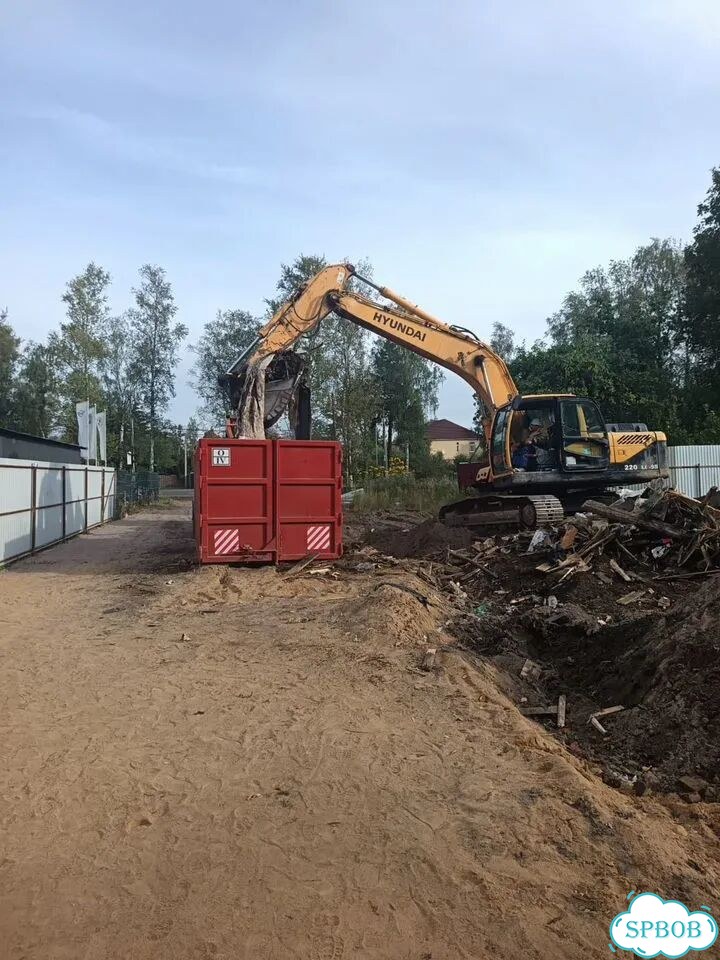 Вывоз мусора контейнером 27м3 фото 2