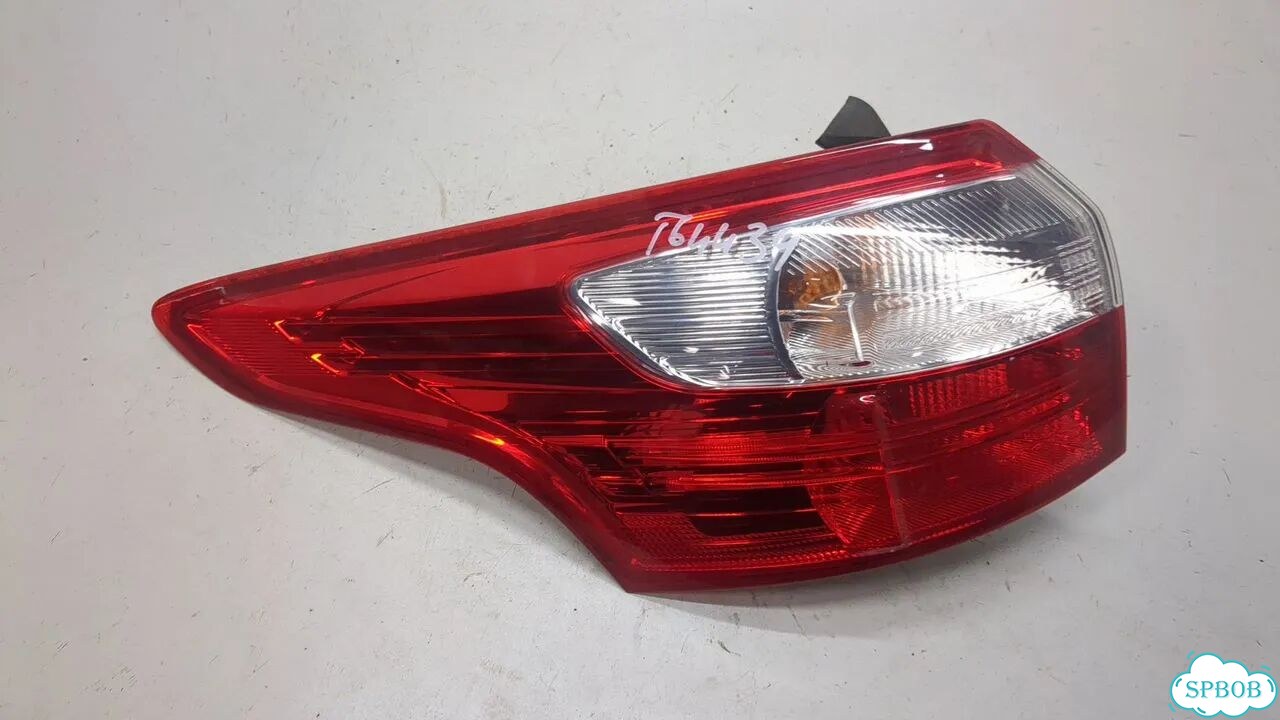 Фонарь (задний) левый Ford Focus 3 фото 1