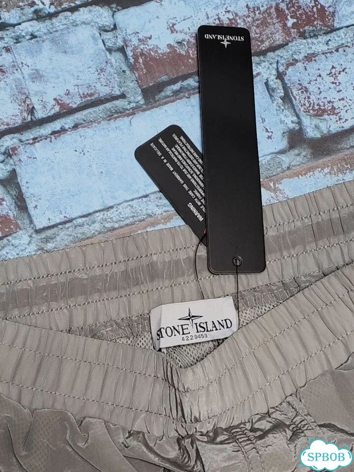 Шорты stone island nylon metal серые фото 6